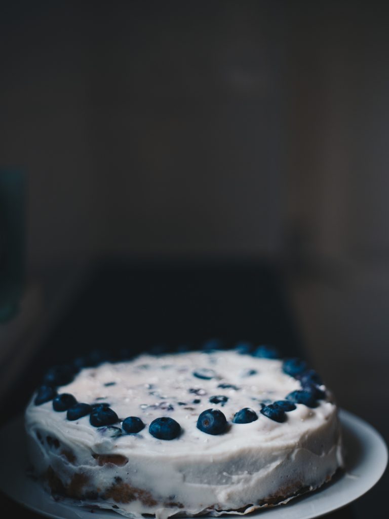 lemon and blueberry cake with coconut frosting vegan