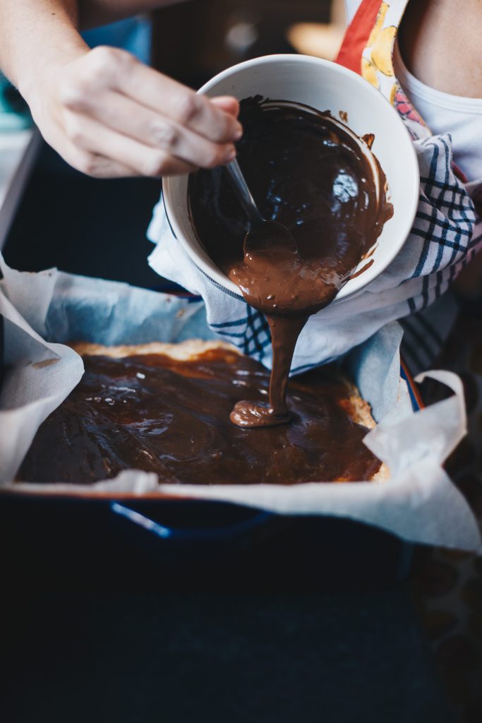 pouring on the chocolate