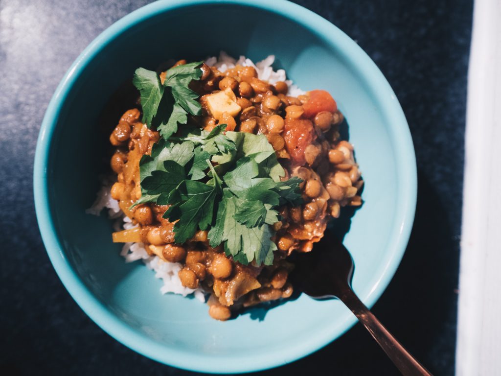 vegan lentil stew over rice