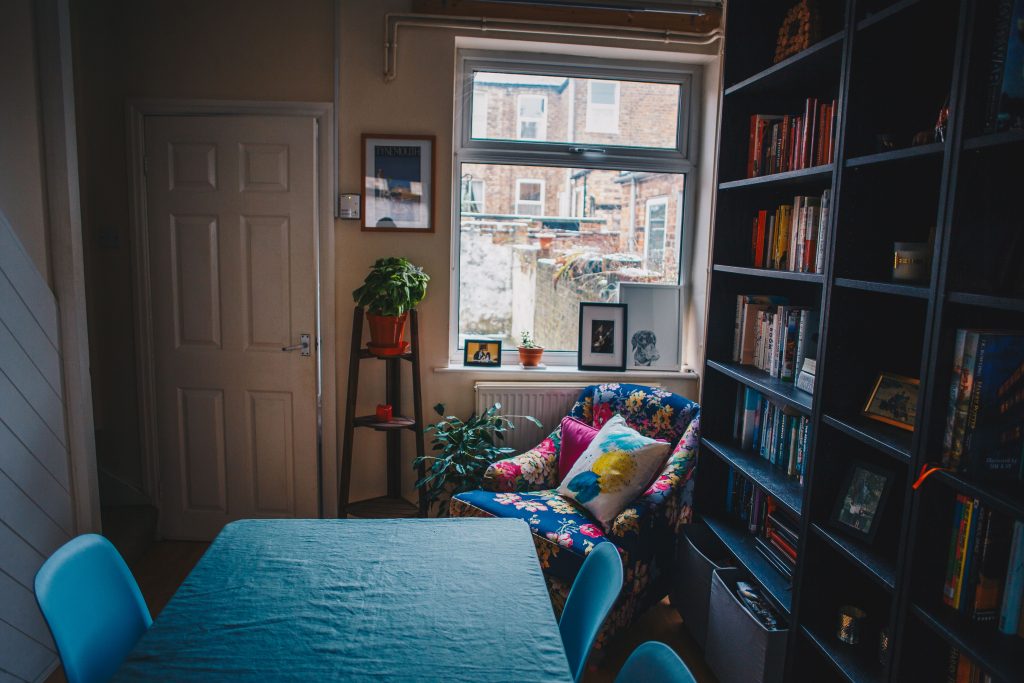 chair, bookshelf and table