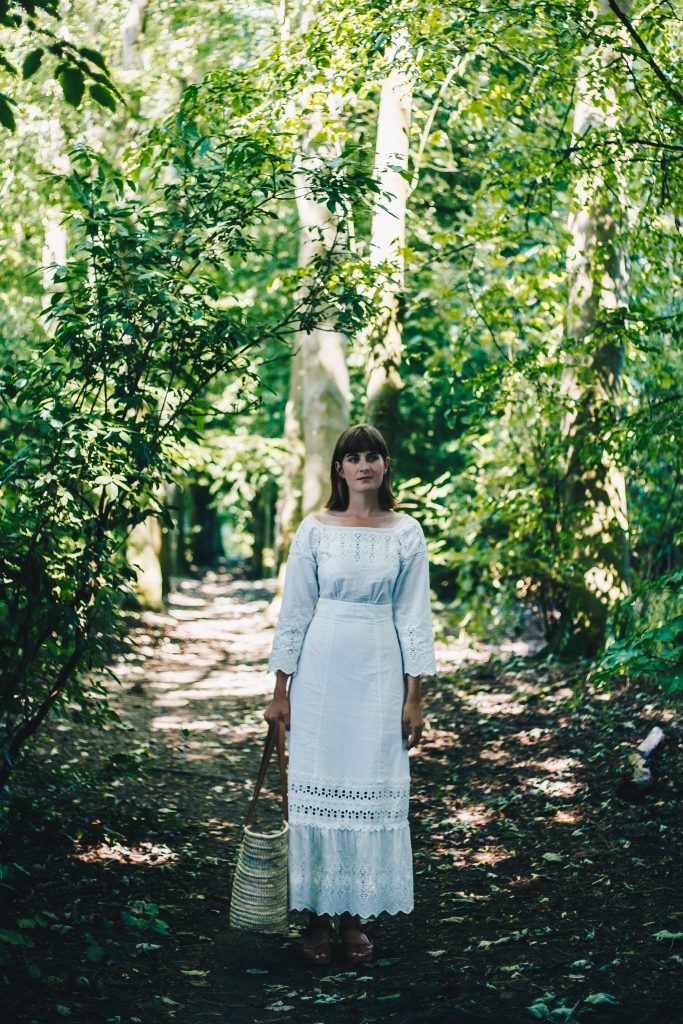white dress in the woods