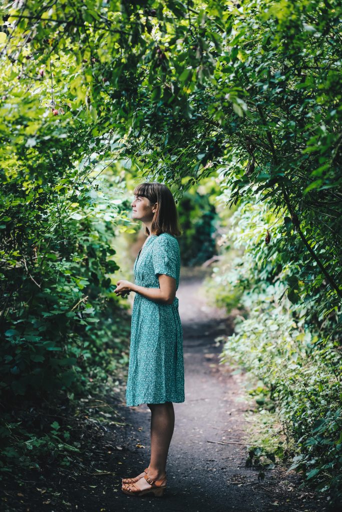 green dress looking for berries