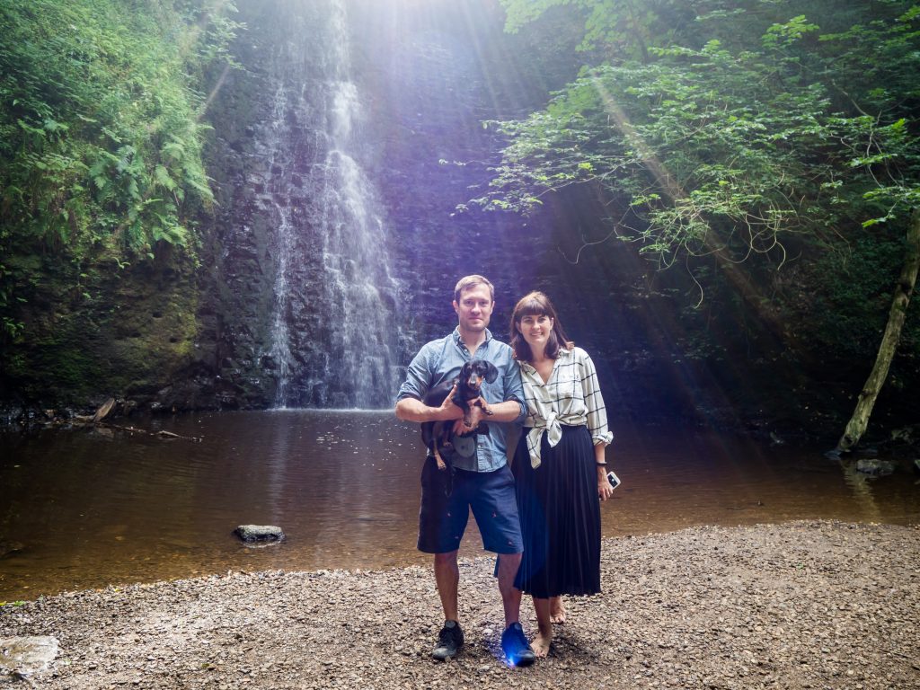 family photo at waterfall
