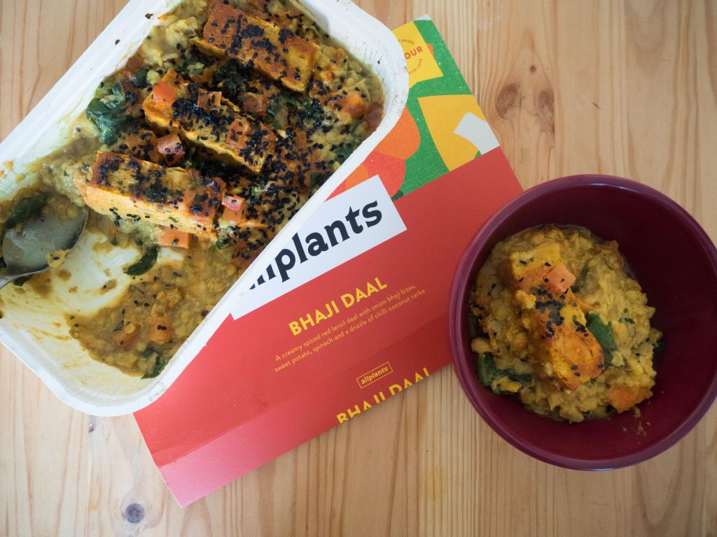 allplants bhaji daal in it's oven tray and plated in a red bowl
